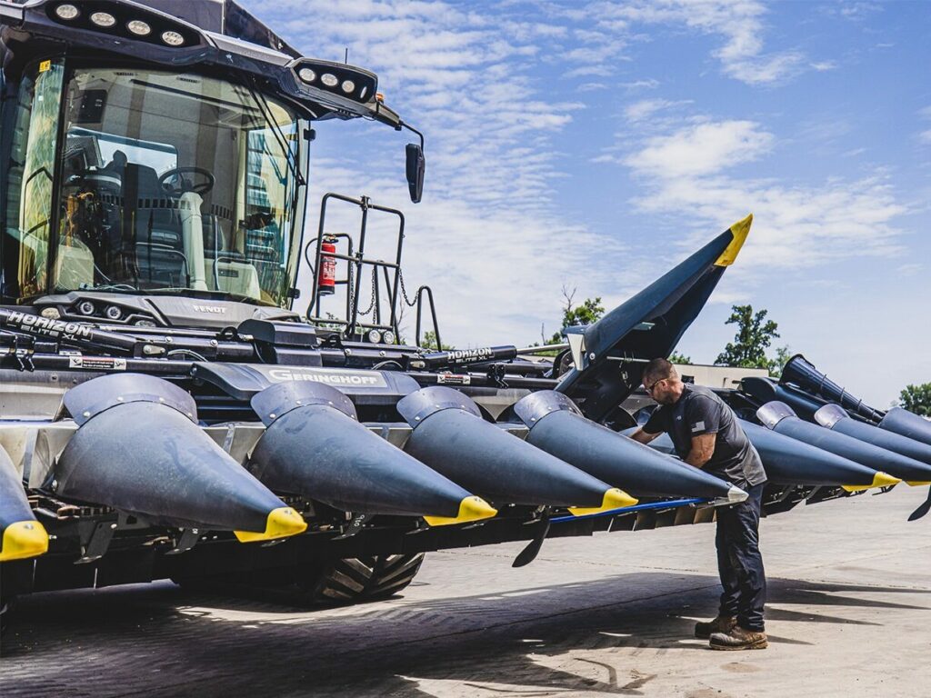 A Ziegler employee provides Agriculture Equipment Service on Ziegler equipment.